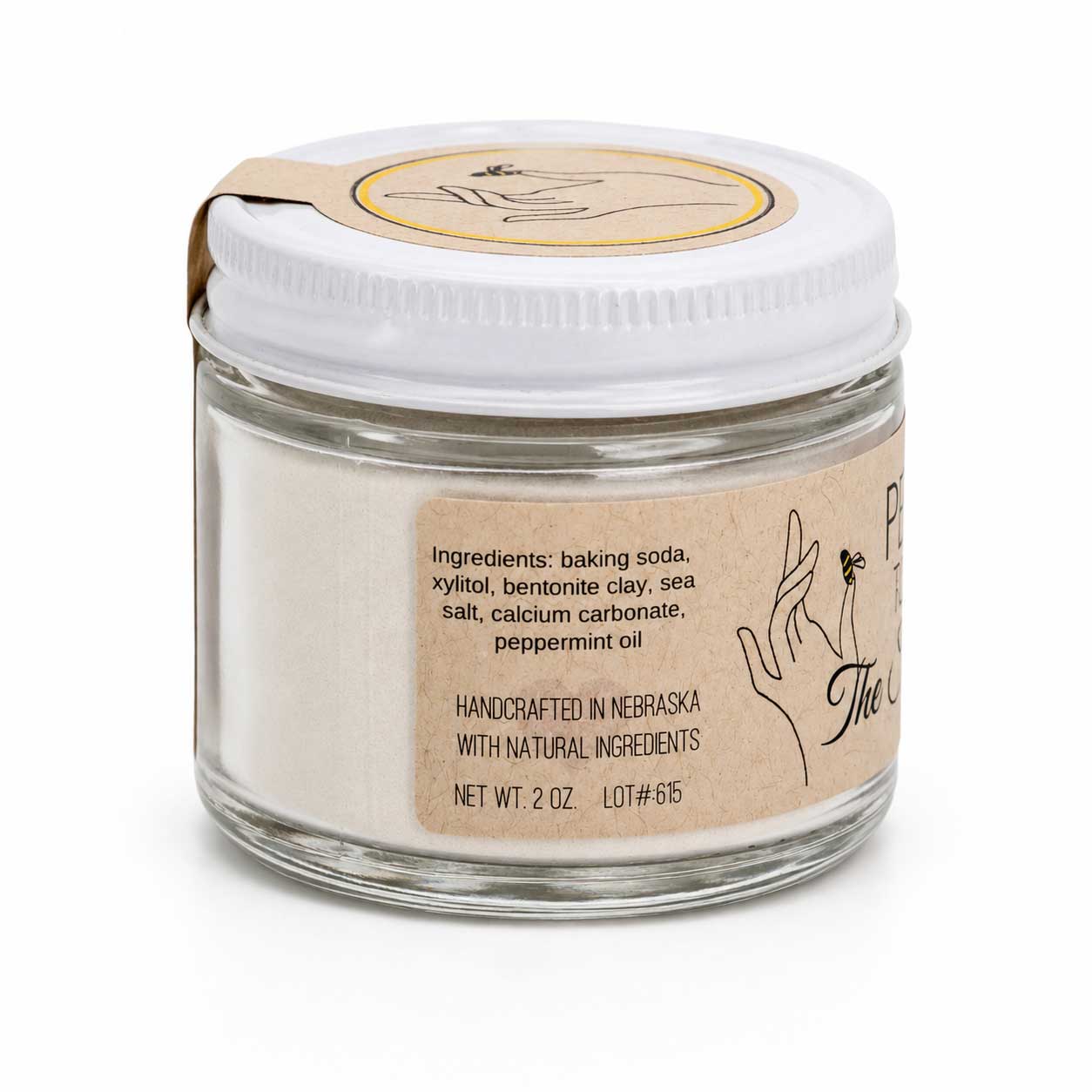 Peppermint-flavored fluoride-free tooth powder in a 2 oz container from The Salvy Lady, part of BuyNebraska.com's bath and body products.