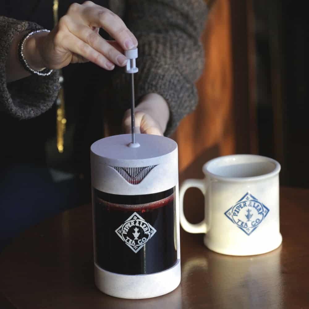 Piper Press brewing device by Piper and Leaf Tea Co. for steeping tea leaves in a sleek, modern tea press.