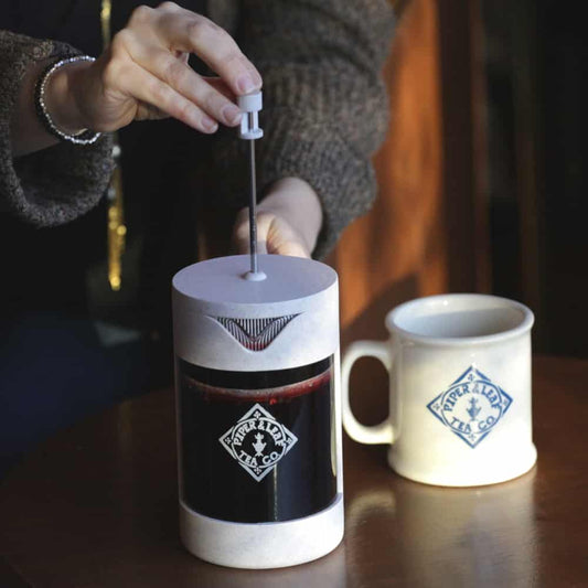 Piper Press brewing device by Piper and Leaf Tea Co. for steeping tea leaves in a sleek, modern tea press.