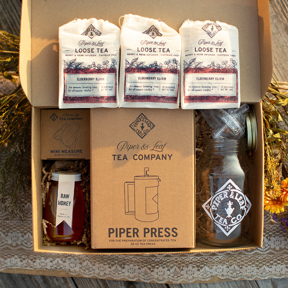 Elderberry Elixir Complete Syrup Kit gift set by Piper and Leaf Tea Co. includes ingredients and tools for making elderberry syrup.