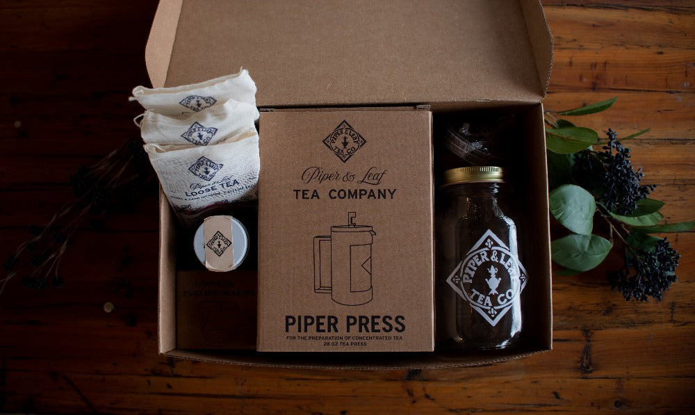 Elderberry Elixir Complete Syrup Kit gift set by Piper and Leaf Tea Co., includes bottles and ingredients for homemade elderberry syrup.