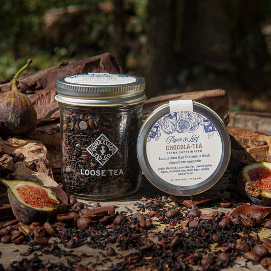 Glass jar of Piper and Leaf Tea Co. Chocola-Tea loose leaf tea with 30 servings, showing dark chocolate-flavored tea leaves inside.