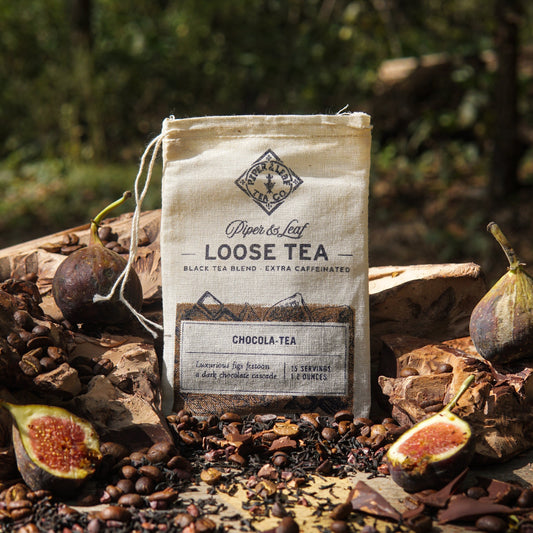 Piper and Leaf Tea Co. Chocola-Tea loose leaf tea in muslin bag, showing rich cocoa-colored tea leaves and label.