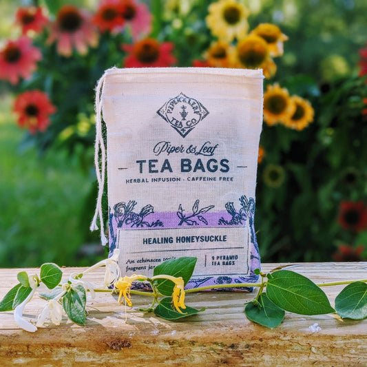 Healing Honeysuckle 9ct tea bags in muslin from Piper and Leaf Tea Co. with herbal tea bags displayed in a muslin pouch.