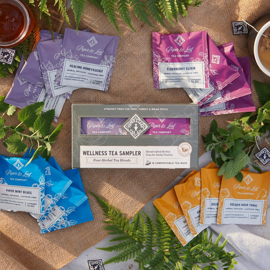 Box of 16 Piper and Leaf Wellness Tea Sampler Tea Bags featuring a variety of herbal and wellness teas in colorful packaging.