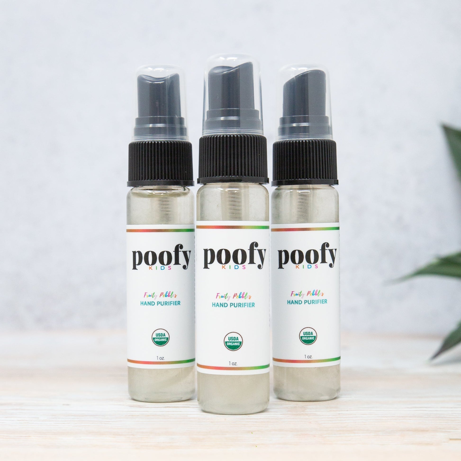 Poofy Organics kids' outdoor hand sanitizer 3-pack with fruity pebble scent, portable travel size for children.