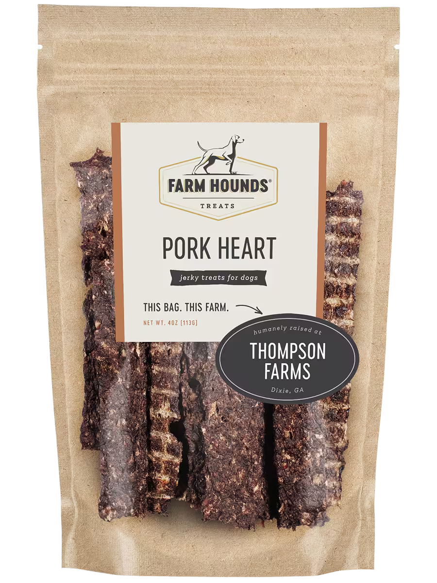 Fresh Farm Hounds pork heart, an organ meat with visible muscle texture and deep red color, shown from the front view.