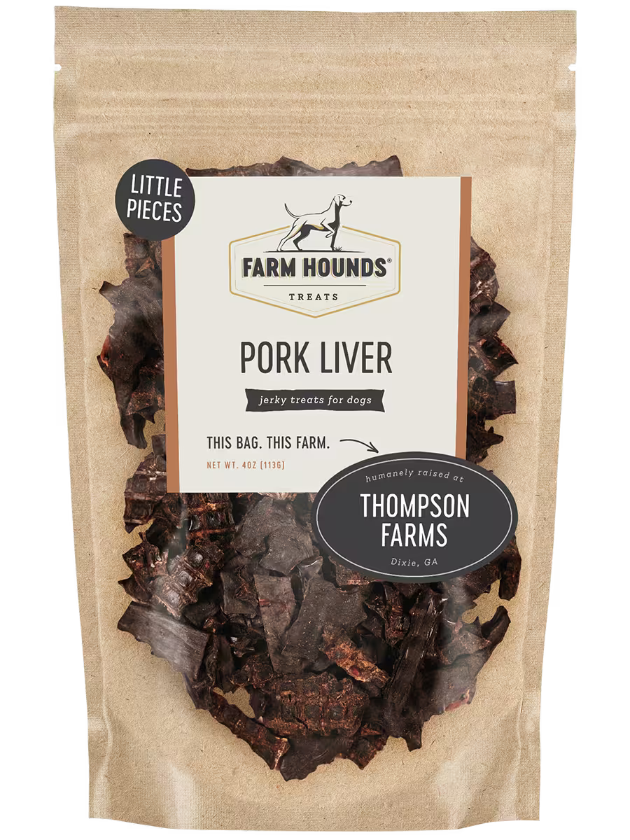 Slices of pork liver, a nutritious organ meat from Farm Hounds, shown in small pieces on a white background.
