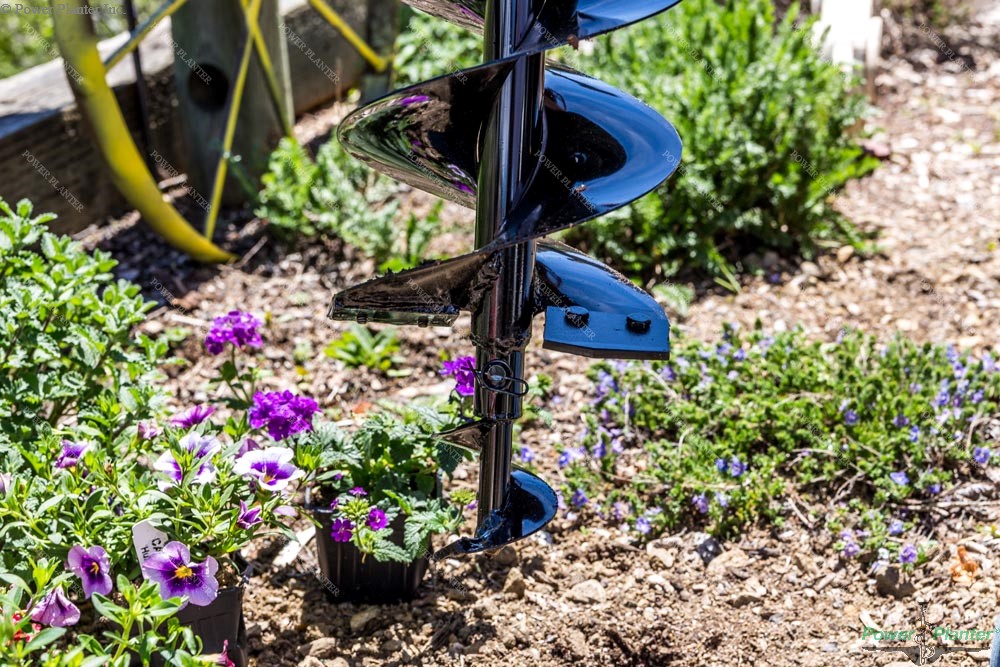 Power Planter Augers heavy-duty gallon pot and post hole auger, 7" x 28", used for drilling holes in soil for planting or fencing.