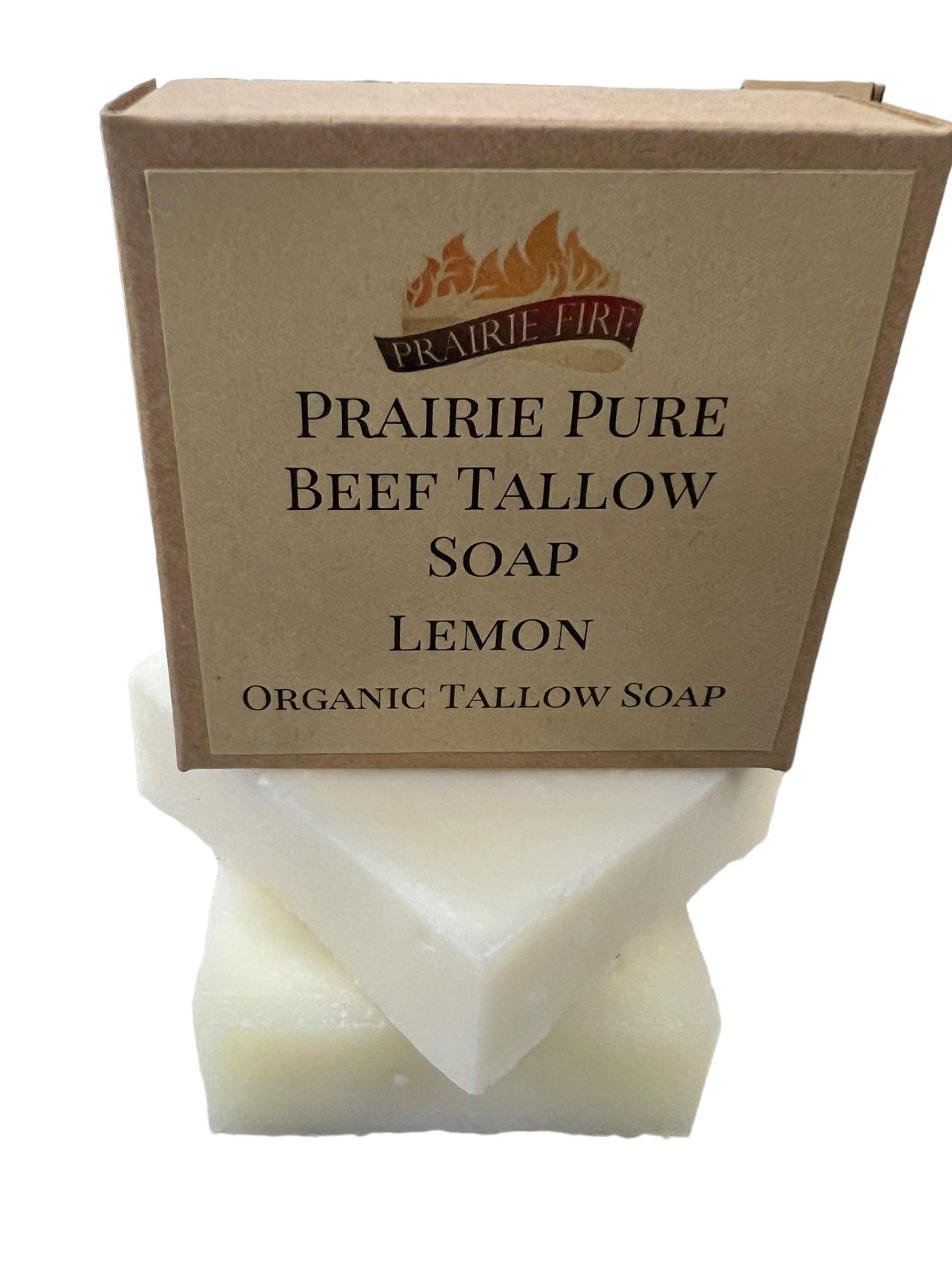 A box labeled Prairie Fire Tallow Pure Beef Tallow Soap Bar (3 Pack) sits atop two stacked white bars of natural, organic, grass-fed tallow soap for face, body, and hair—made in the USA to cleanse, moisturize, and soothe.
