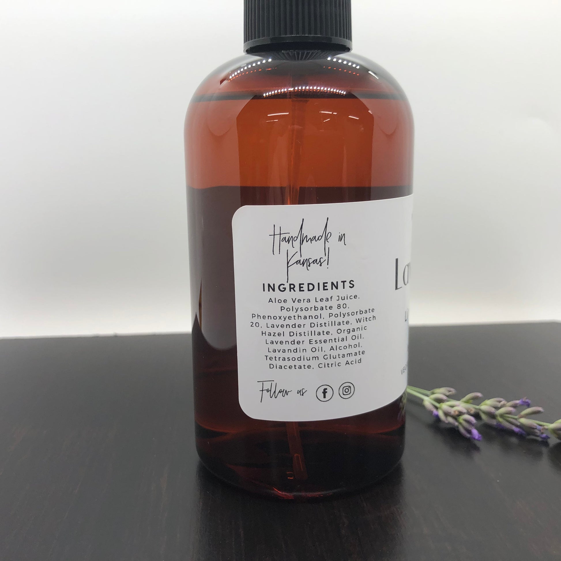 Lavender Linen Spray by Prairie Fire Tallow, 8oz bottle with lavender flowers and spray nozzle, fresh and soothing linen scent