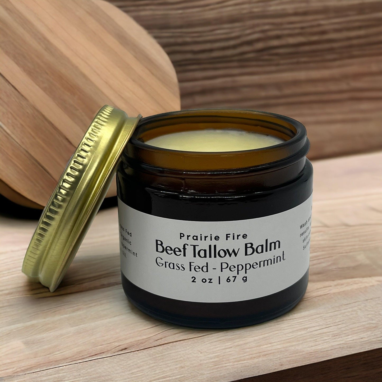 Prairie Fire Tallow Beef Tallow Balm 2 oz moisturizing lotion with organic grass-fed beef tallow for skin care, fragrance-free.