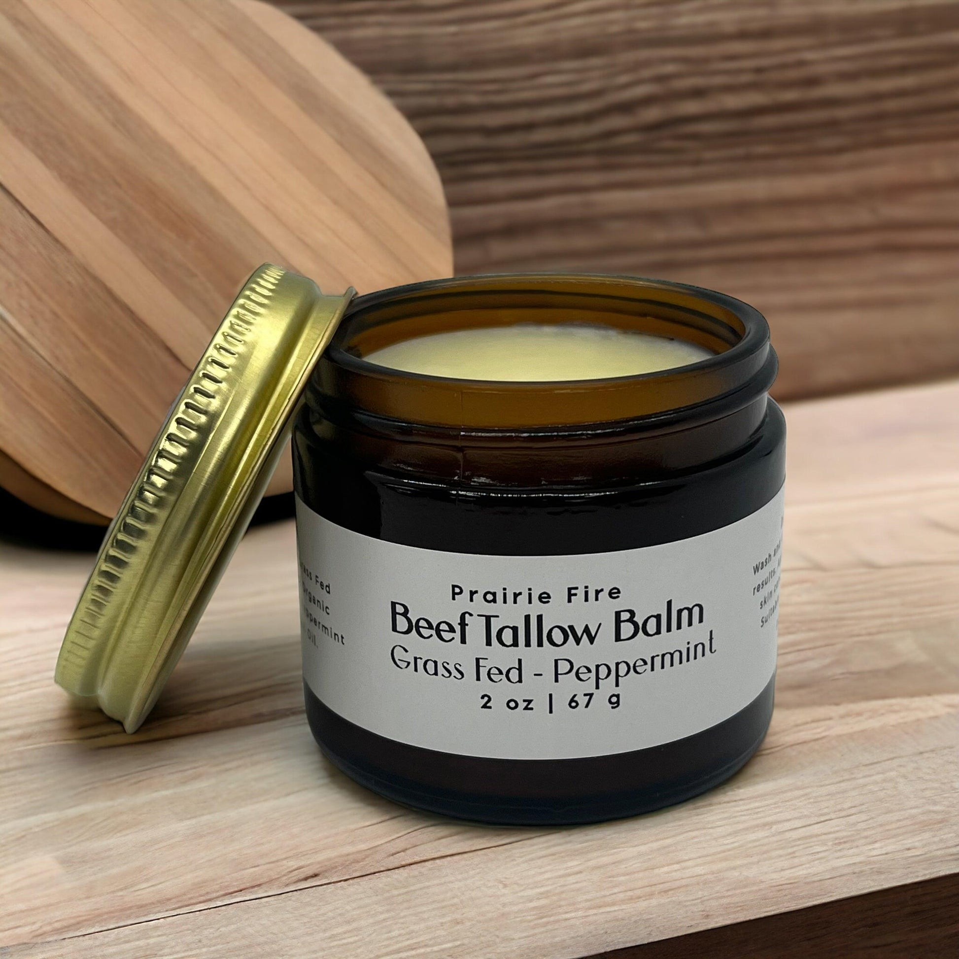 Prairie Fire Tallow Beef Tallow Balm 2 oz moisturizing lotion with organic grass-fed beef tallow for skin care, fragrance-free.