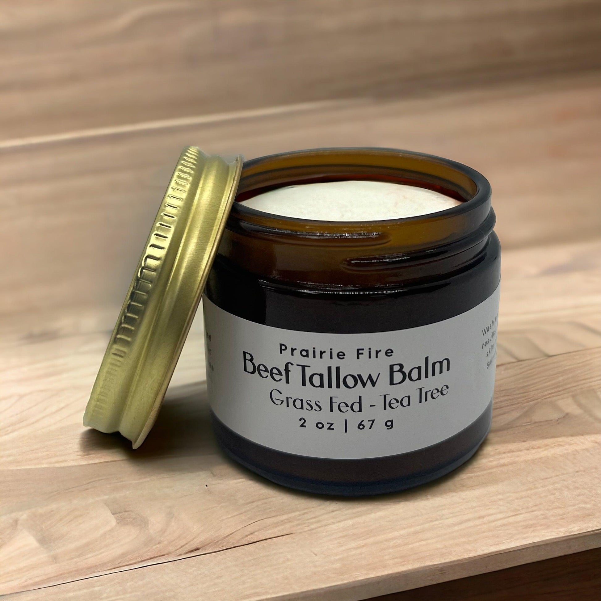 Prairie Fire Tallow Beef Tallow Balm in 2 oz jar, organic grass-fed, fragrance-free moisturizer for nourishing skin care.