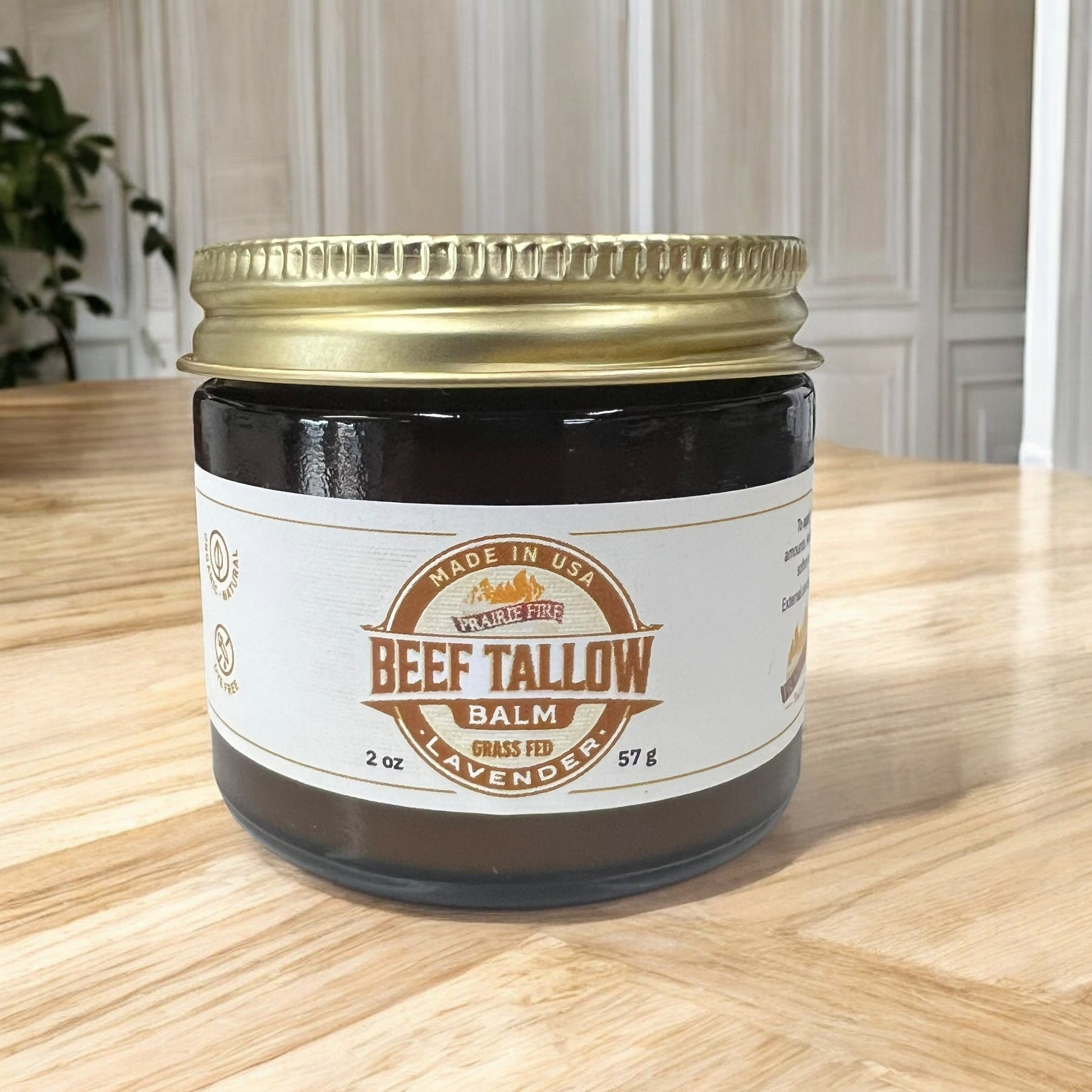Prairie Fire Tallow Beef Tallow Balm 2 oz moisturizer, organic grass-fed, fragrance-free skin care in a small jar.