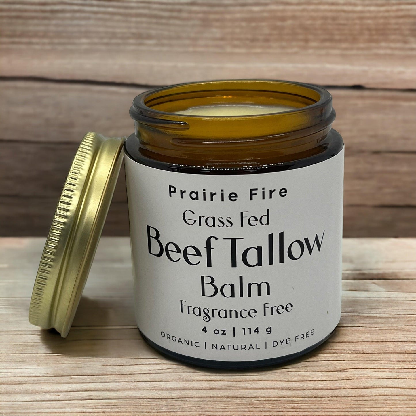 Prairie Fire Tallow Beef Tallow Balm 4 oz moisturizer jar showing organic grass-fed tallow for nourishing skin care.