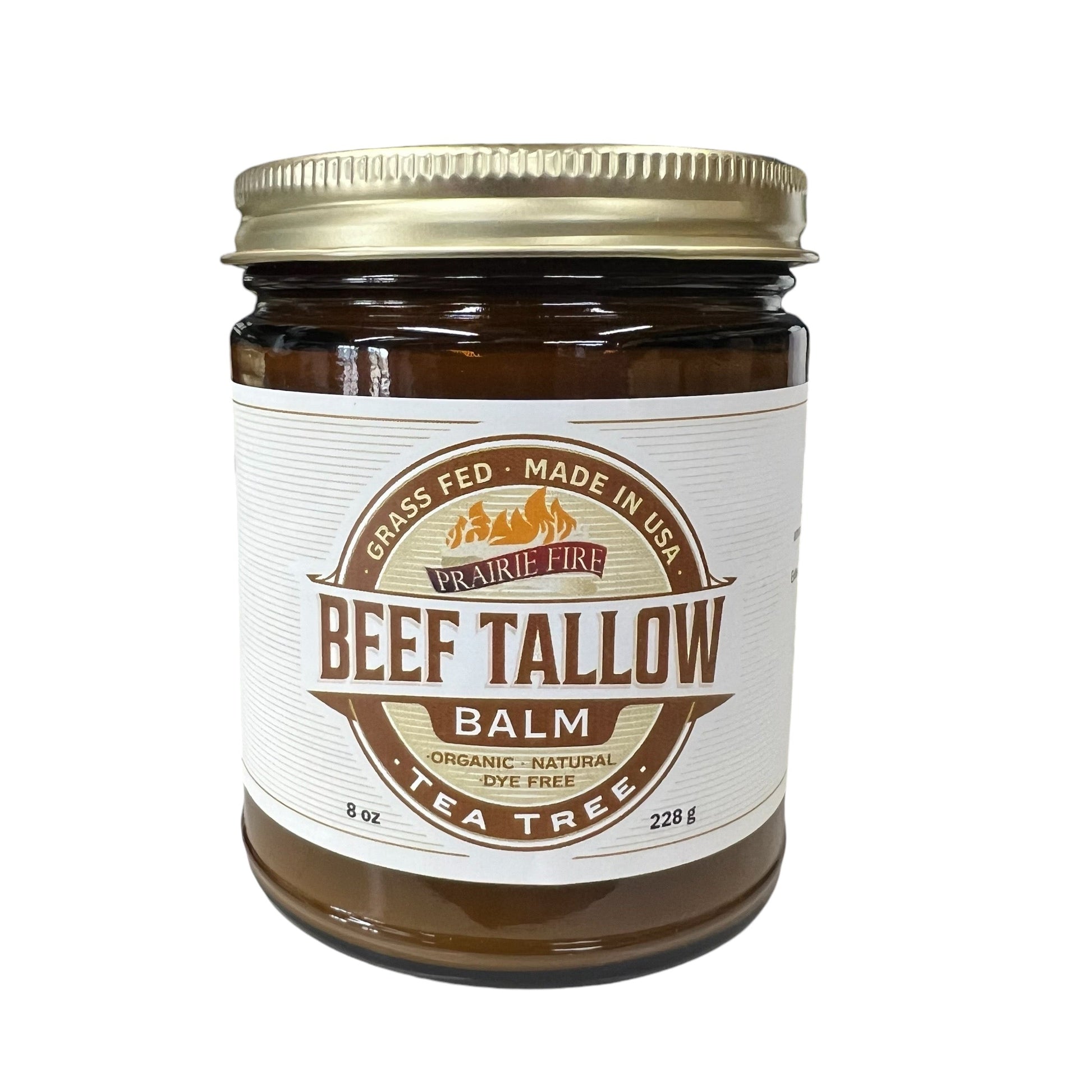 Beef Tallow Balm by Prairie Fire Tallow, Candles, and Lavender is an 8 oz natural moisturizer made in the USA with organic grass-fed tallow and tea tree. Comes in a brown glass jar with a gold lid.