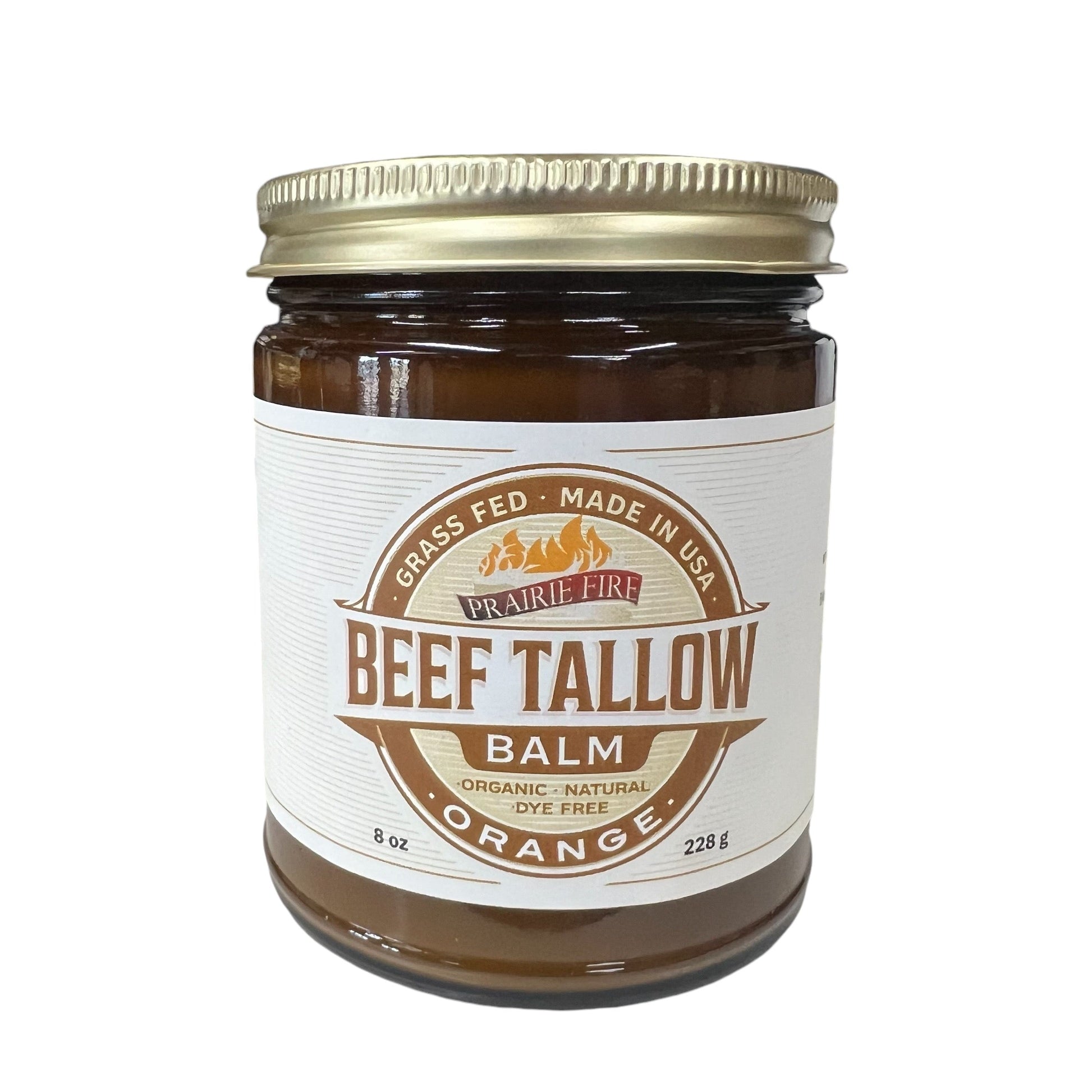 Prairie Fire Tallow, Candles, and Lavender Beef Tallow Balm is a moisturizing skin care balm in an 8 oz jar. Made in the USA from organic grass-fed beef tallow, it’s dye-free, orange scented, and features a gold lid with a white-brown label.