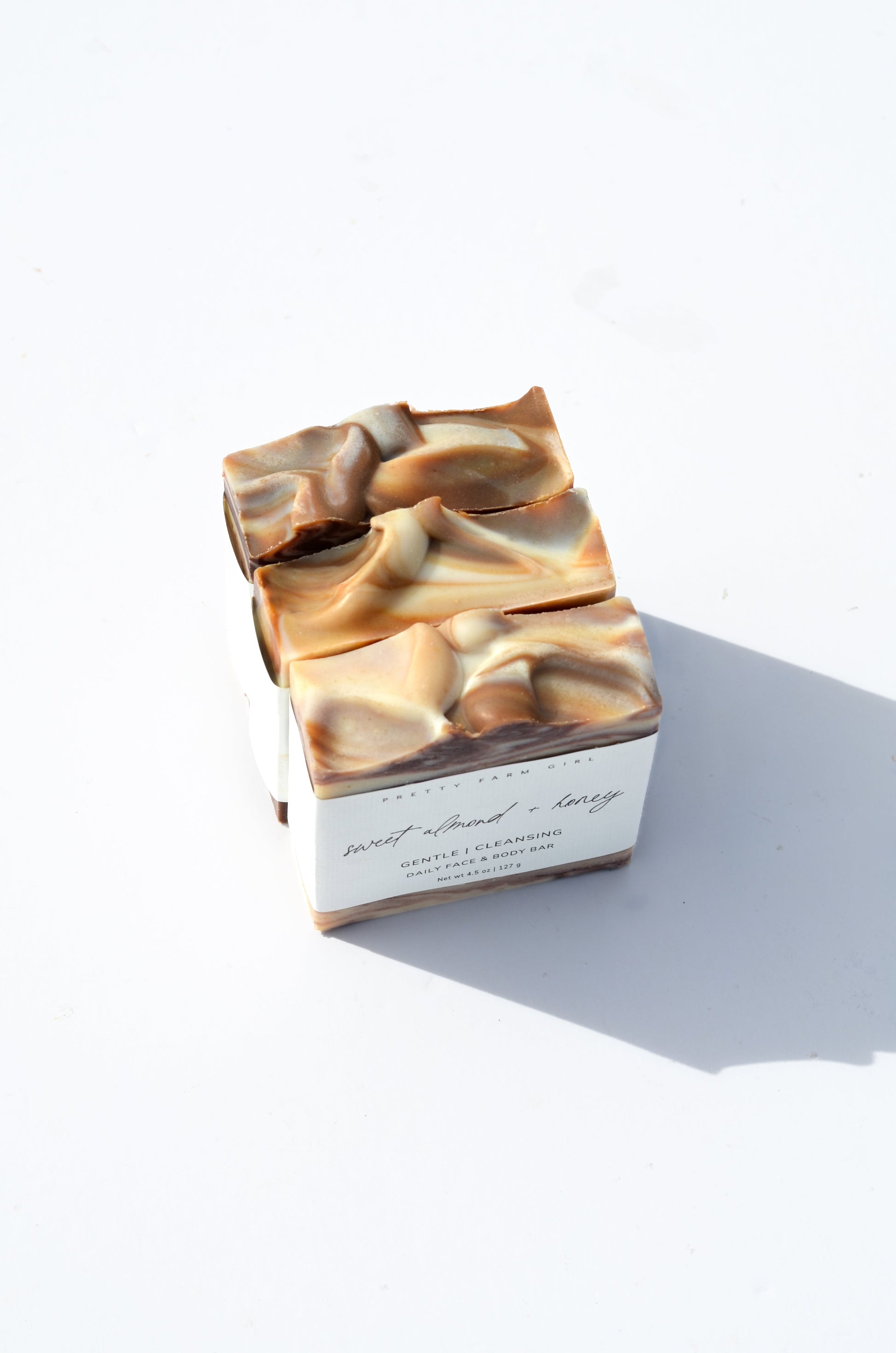 Handmade Sweet Almond and Honey Tallow and Goat Milk Soap Bar by Pretty Farm Girl, showing a natural soap bar with almond and honey accents.
