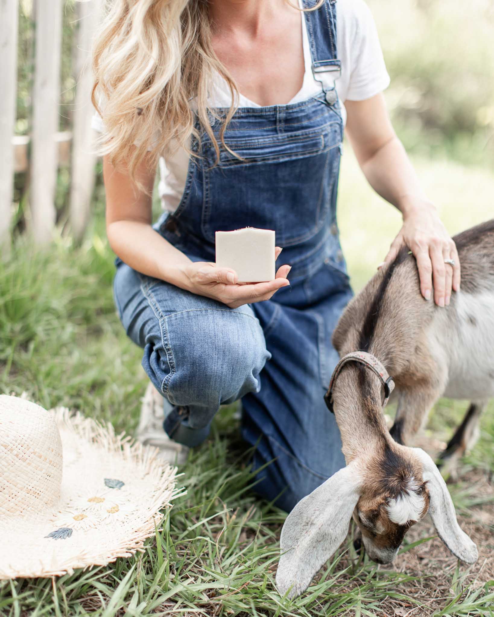 Wild lavender handmade tallow and goat milk soap bar by Pretty Farm Girl, showing a rustic soap with lavender and creamy texture.