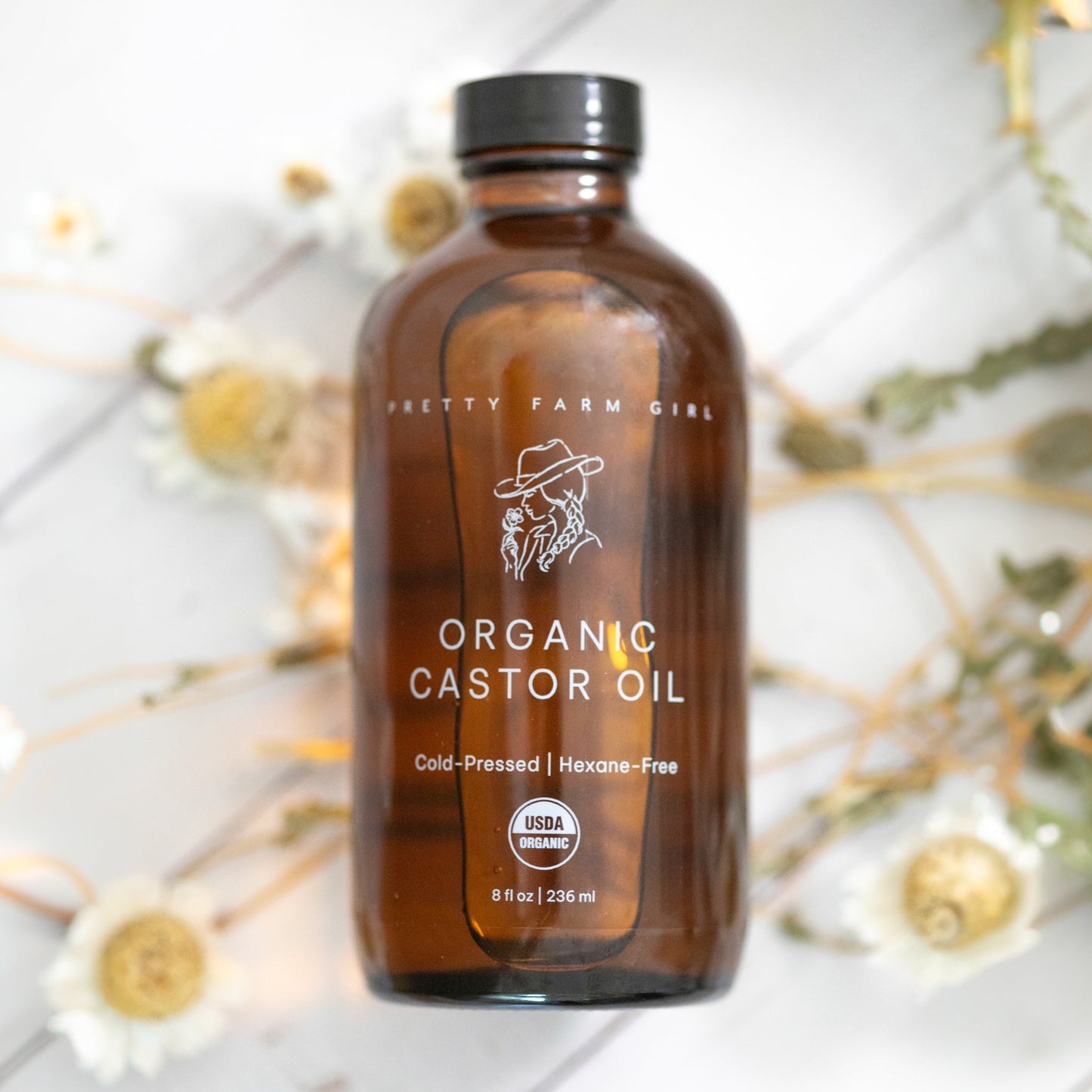 Pure organic cold pressed castor oil by Pretty Farm Girl, 16 oz, hexane-free essential oil in a clear glass bottle