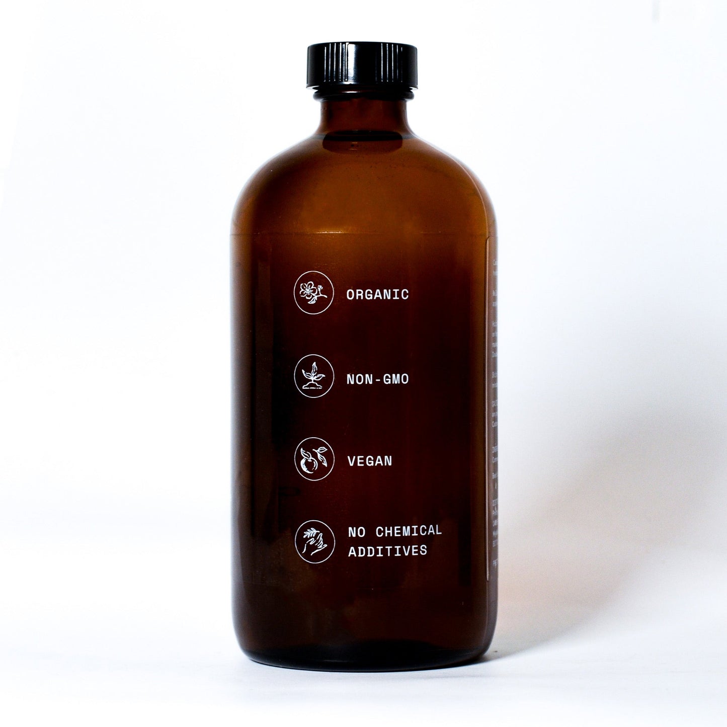 Pure organic castor oil from Pretty Farm Girl, 16 oz, cold-pressed, hexane-free essential oil in a clear glass bottle.