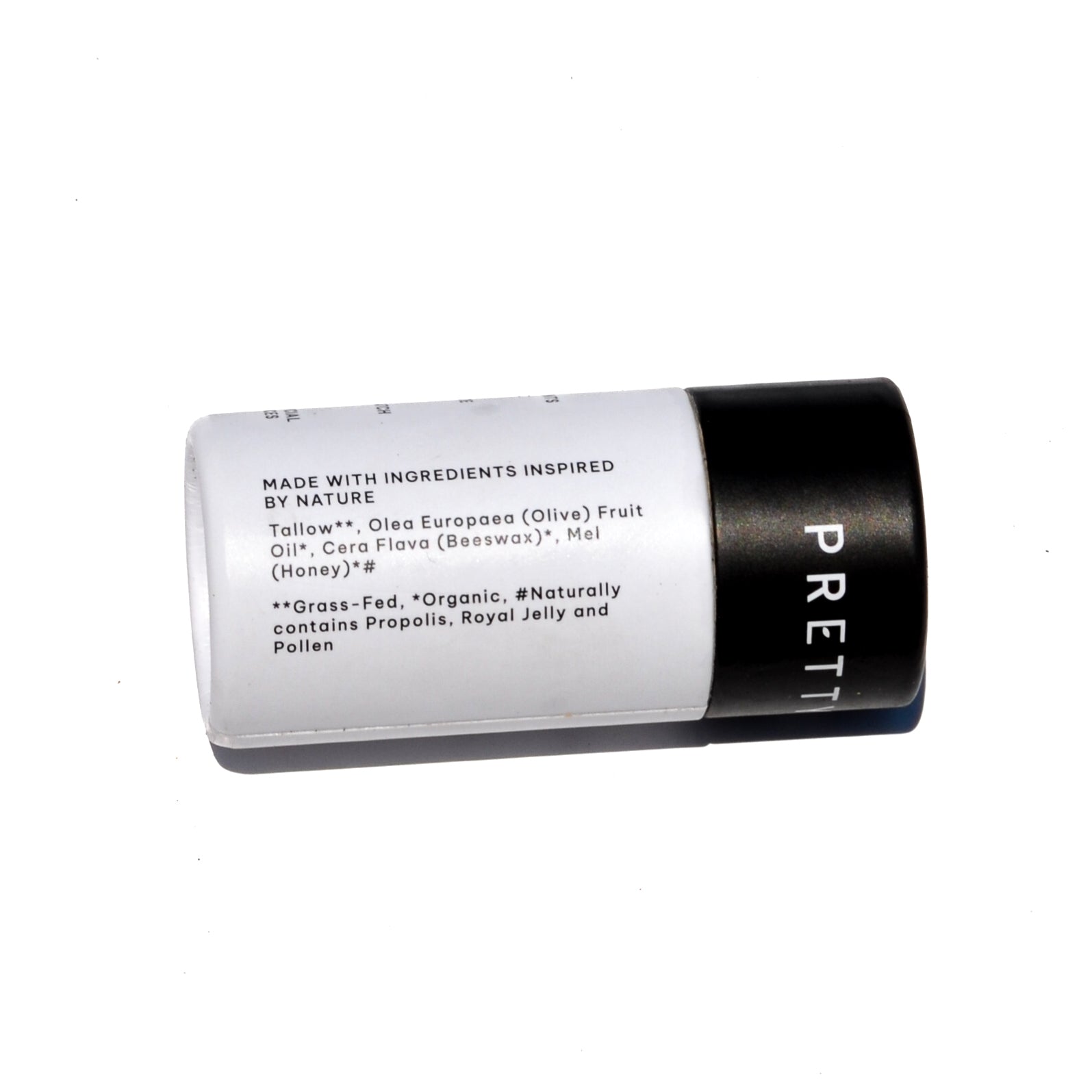 Fragrance-free tallow and honey lip butter by Pretty Farm Girl in eco-friendly travel tube, showing smooth, natural lip balm.