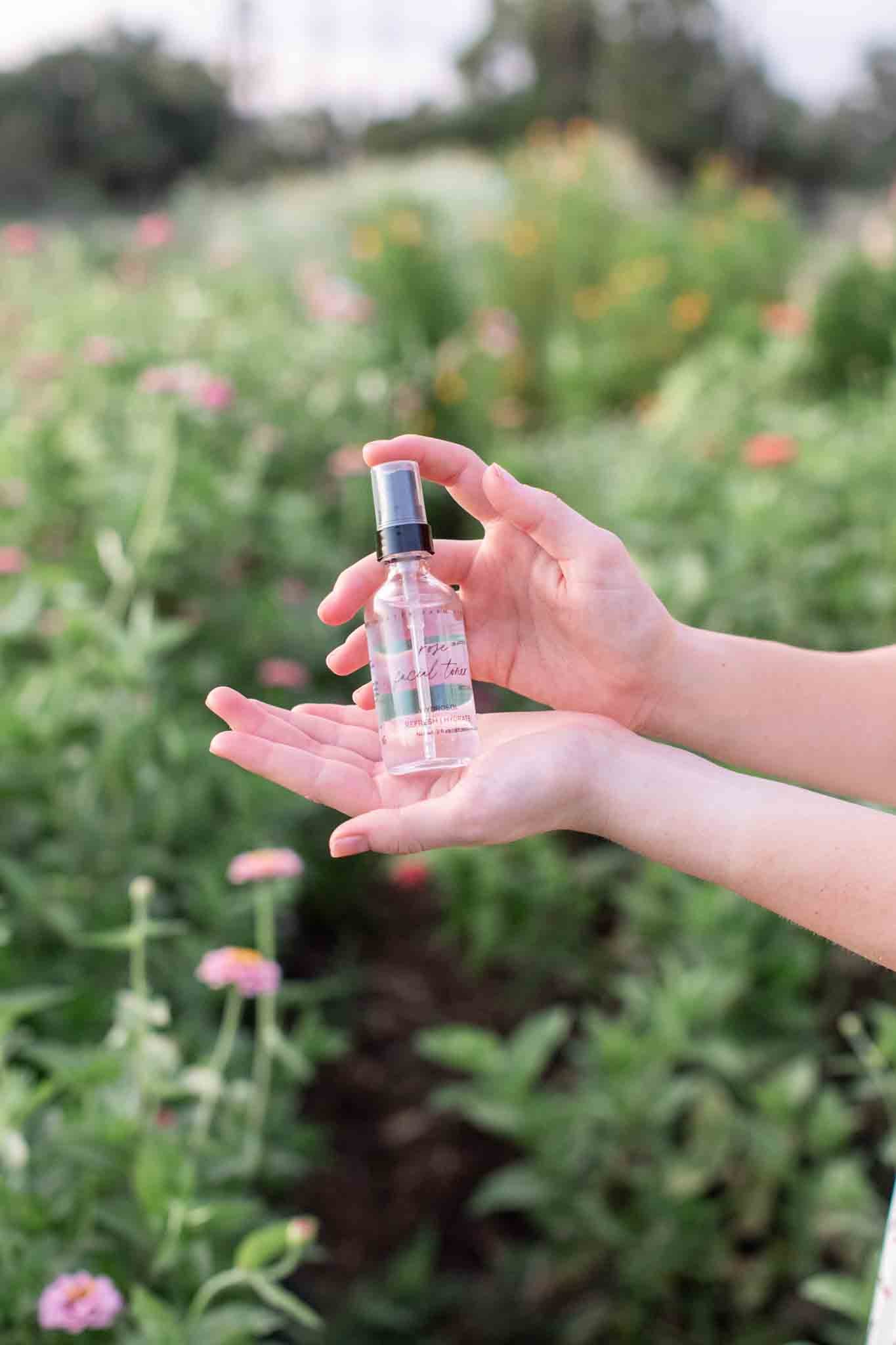 Organic Pure Rose Facial Toner by Pretty Farm Girl in a 2 oz bottle, featuring a clear liquid with a rose scent.