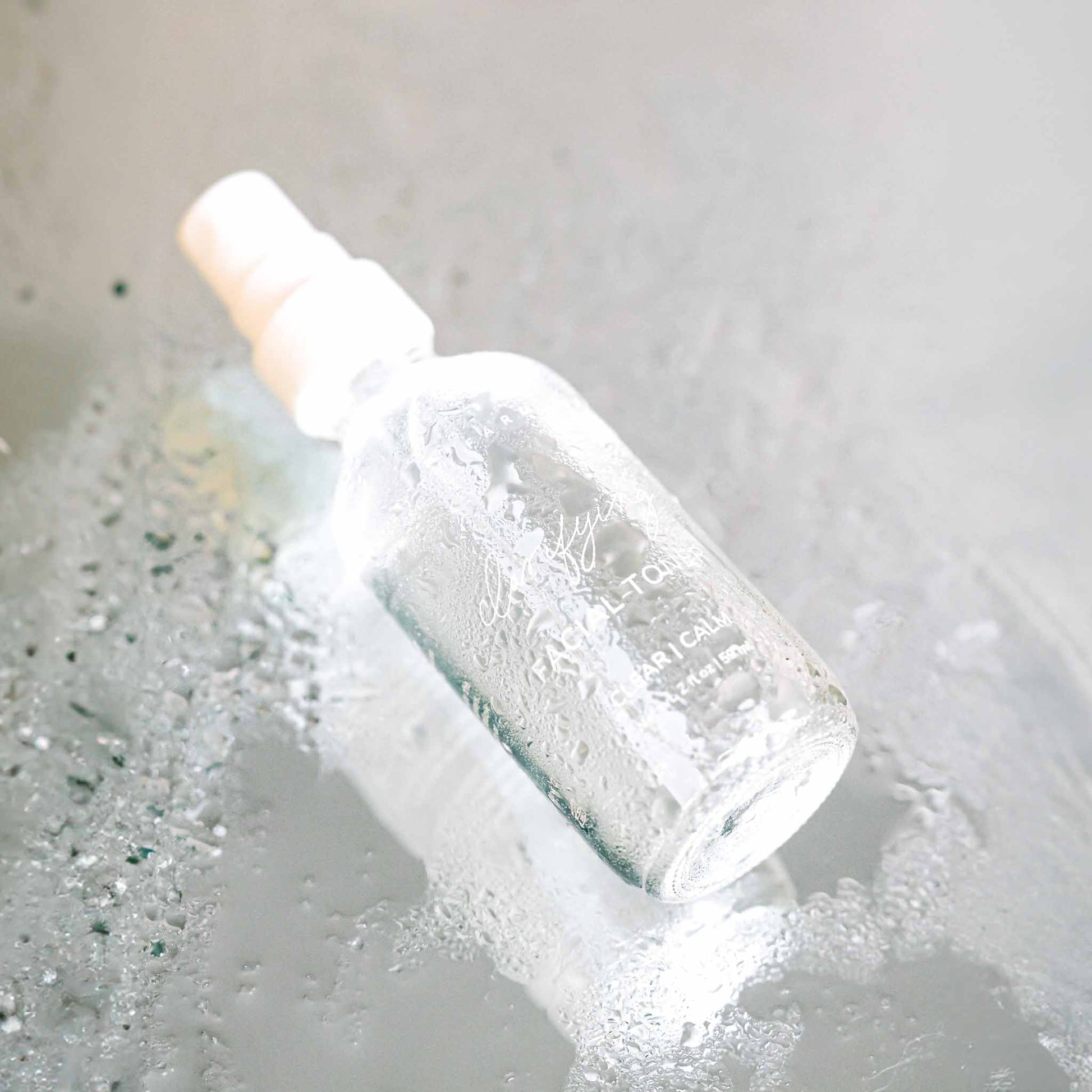 Pretty Farm Girl Clarifying Hypochlorous Acid Toner in a clear bottle, suitable for skincare and facial cleansing.