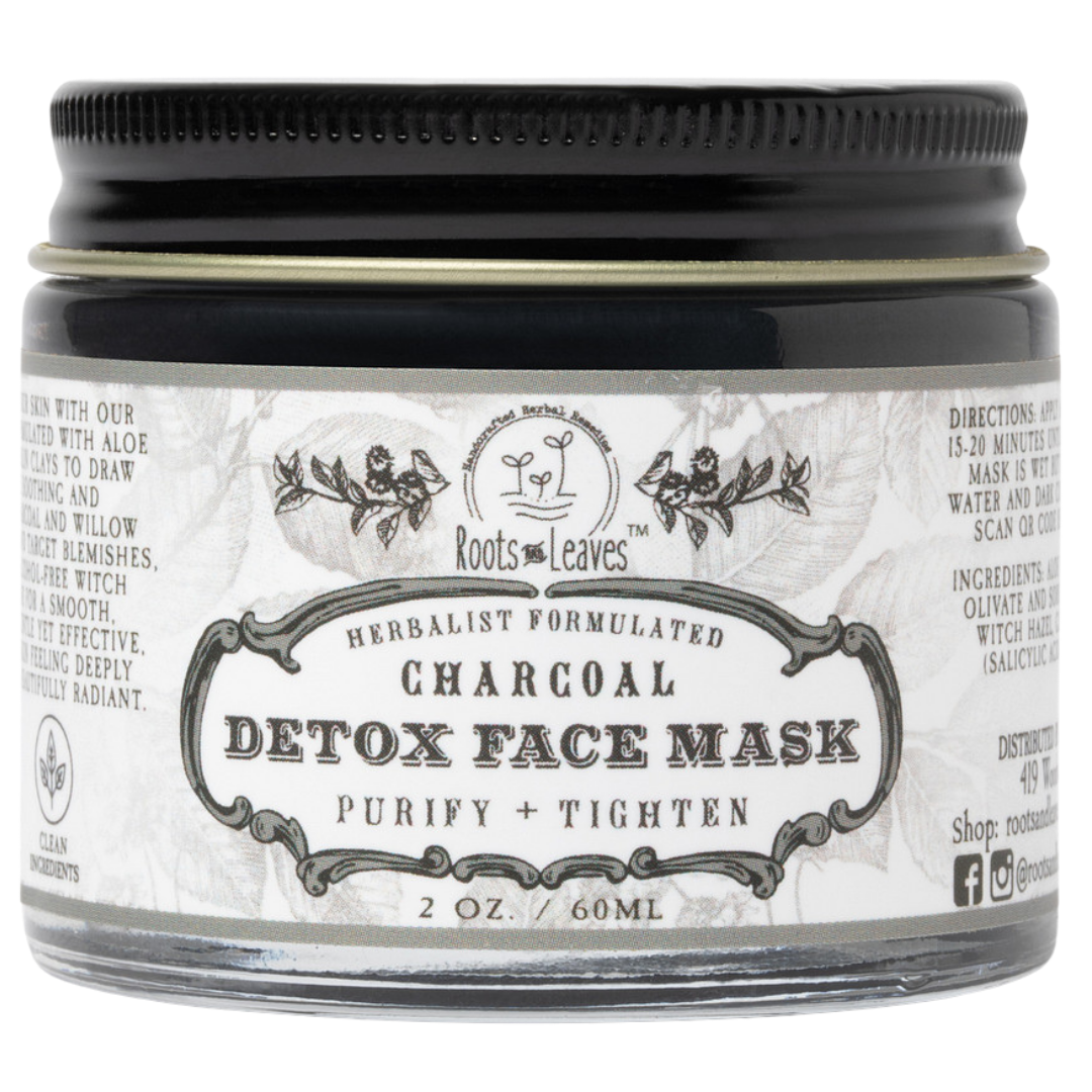 Charcoal detox face mask by Roots and Leaves LLC showing a clay-like mask in a jar, ideal for deep cleansing and skin purification.