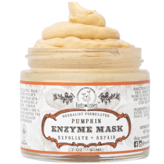 Pumpkin Enzyme Face Mask in a jar, natural skincare product by Roots and Leaves LLC, with pumpkin extract and enzyme ingredients visible.