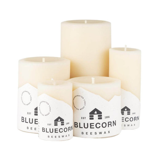 Ivory pure beeswax pillar candles by Bluecorn Candles, showing smooth cylindrical shape and natural beeswax texture.