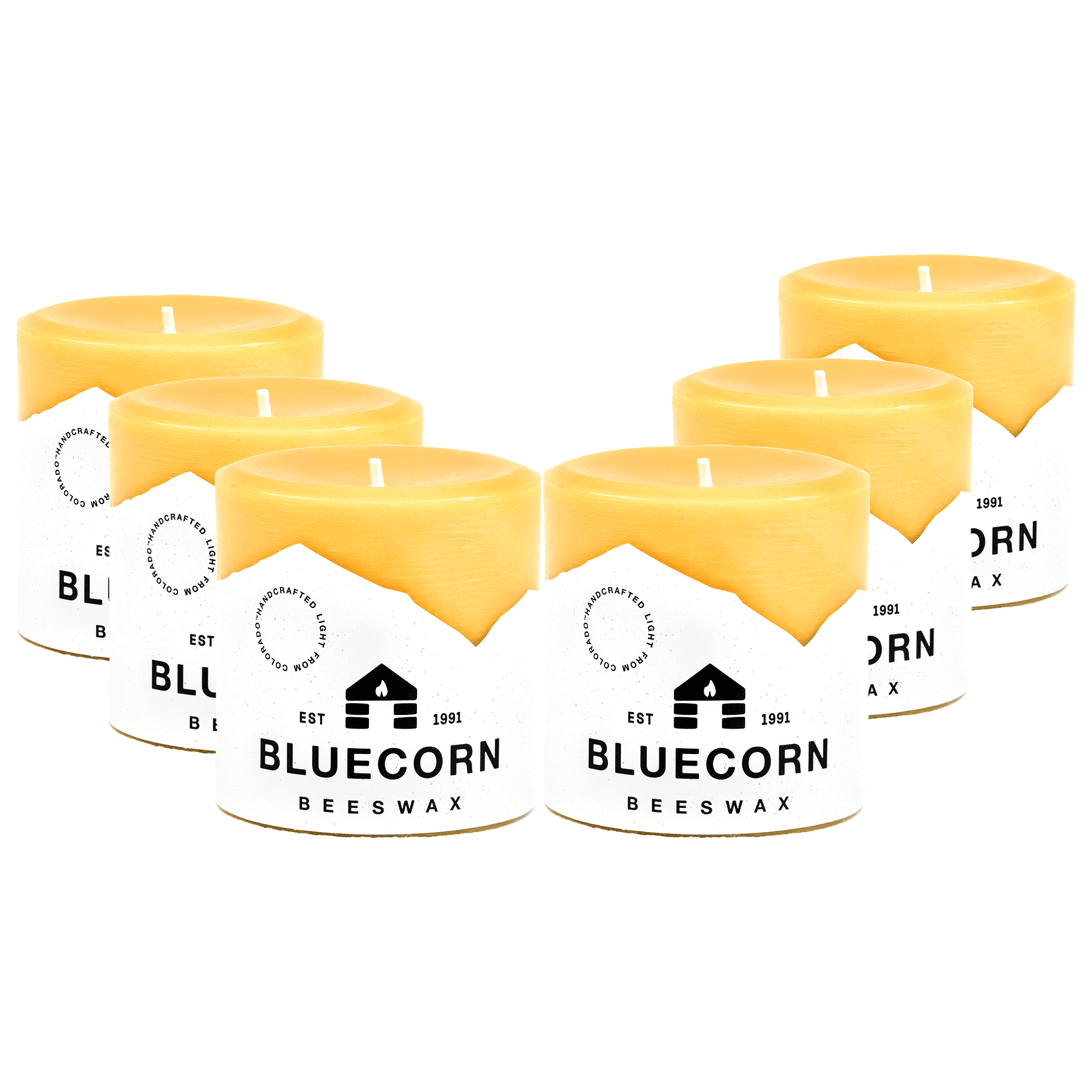 Set of Bluecorn Candles pure beeswax pillar candles, natural yellow color, smooth finish, and tall, elegant design.