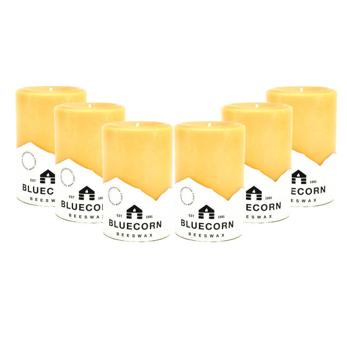 Set of Bluecorn Candles pure beeswax pillar candles with natural golden color and smooth, rounded edges, ideal for home decor.