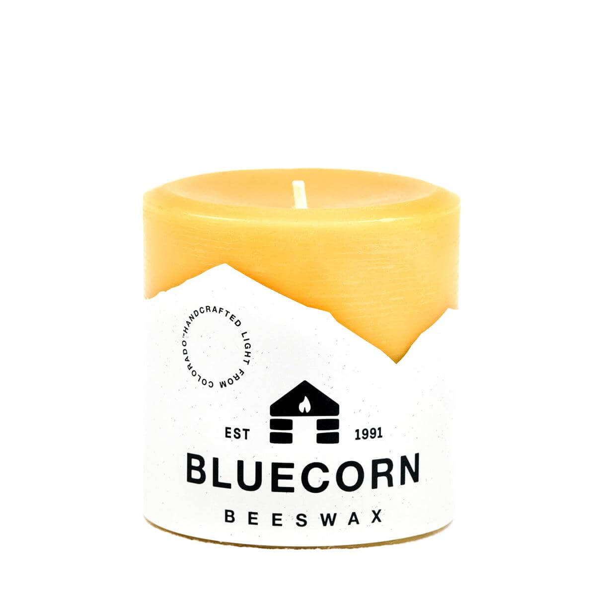 Set of Bluecorn Candles pure beeswax pillar candles in natural beige, cylindrical shape with wicks ready to light.