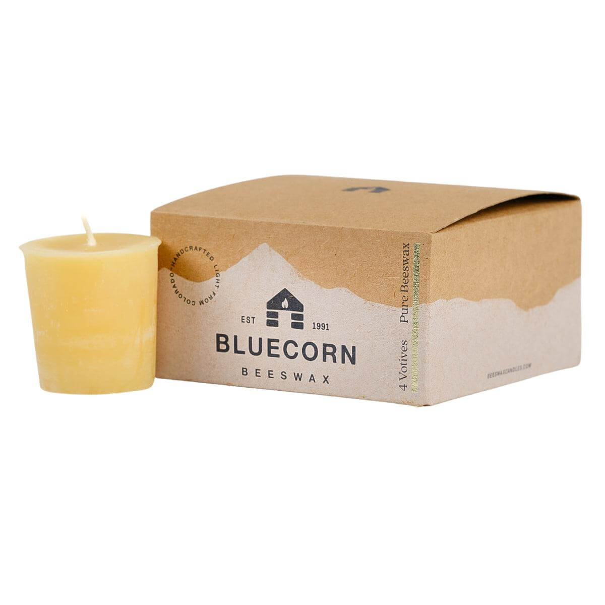 Set of three Bluecorn Candles pure beeswax votive candles with wicks, showcasing natural beeswax texture and warm glow.