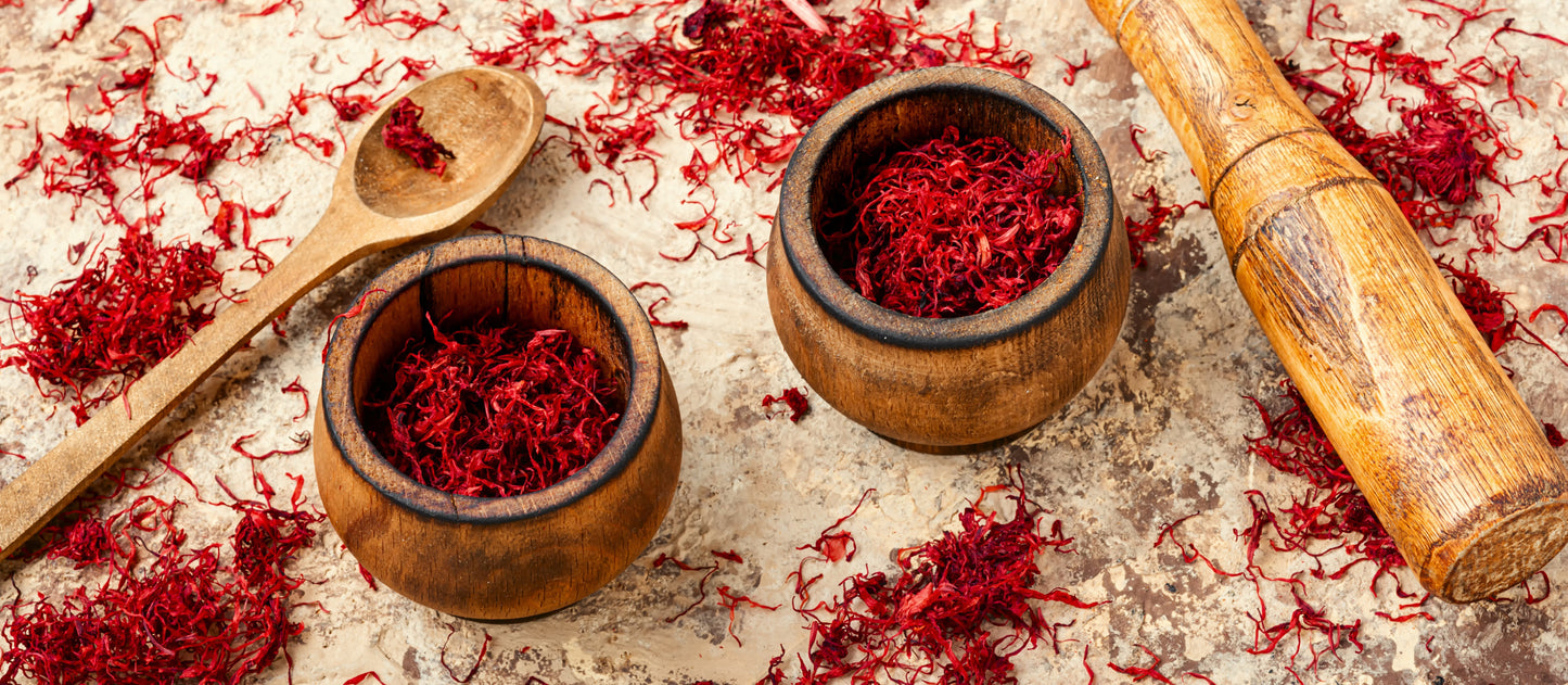Premium Saffron Threads from Vanilla Bean Kings, Super Negin grade, showcasing vibrant orange-red saffron strands on a white background.