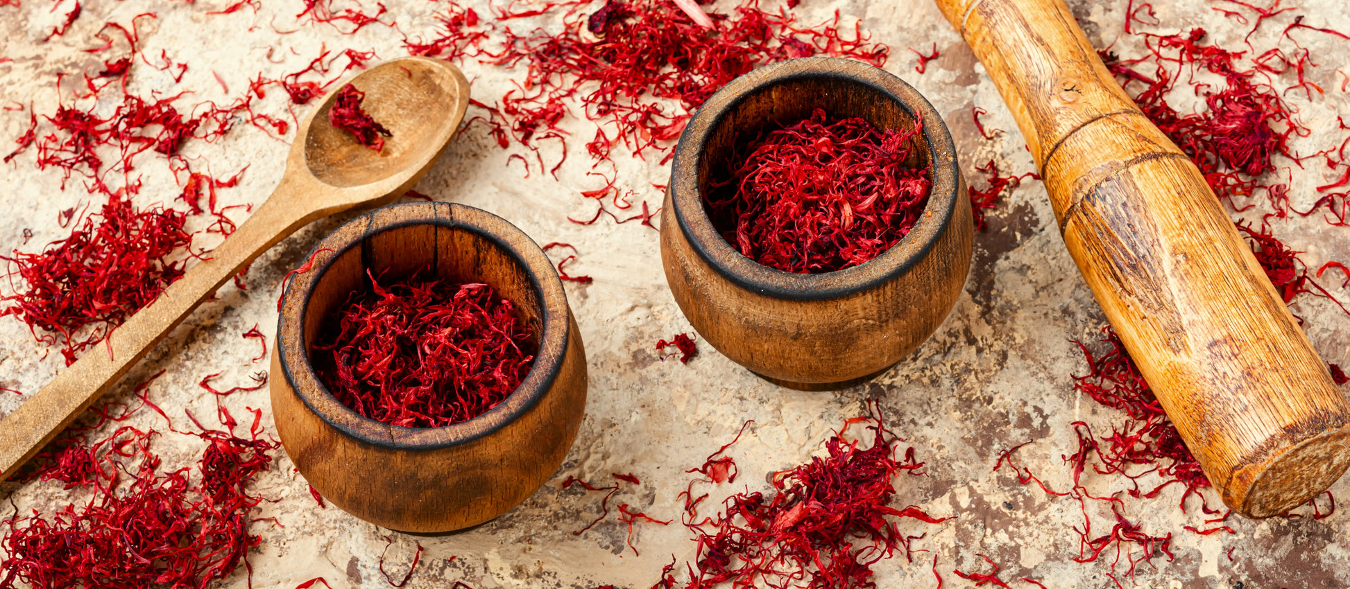 Premium Saffron Threads from Vanilla Bean Kings, Super Negin grade, showcasing vibrant orange-red saffron strands on a white background.