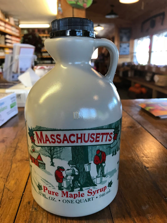 Pint of Massachusetts Maple Syrup from Red Apple Farm, showcasing rich amber syrup in a clear glass bottle.