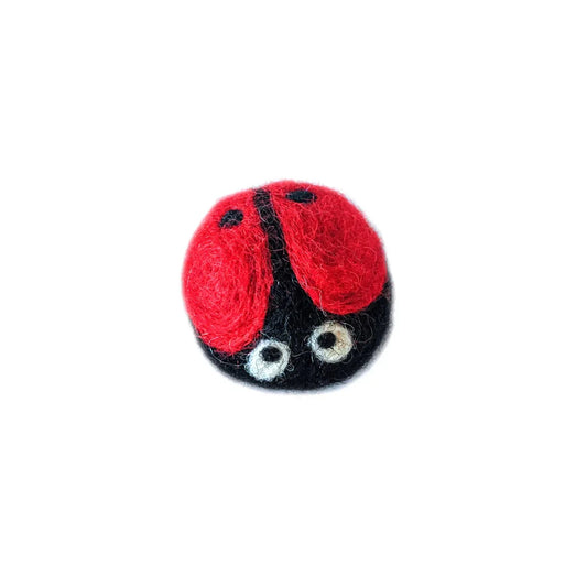 ReNewedPet Gina the Ladybug plush toy made of 100% wool, featuring a bright red body with black spots and cute ladybug details.