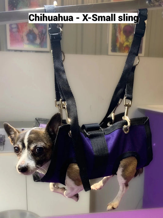 Black ReNewedPet pet grooming sling for small pets, designed to securely hold animals during grooming sessions.