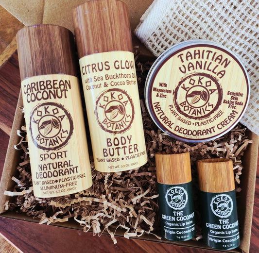 Kokoa Botanics Body Care Gift Set with natural skincare products including lotions and scrubs in eco-friendly packaging.