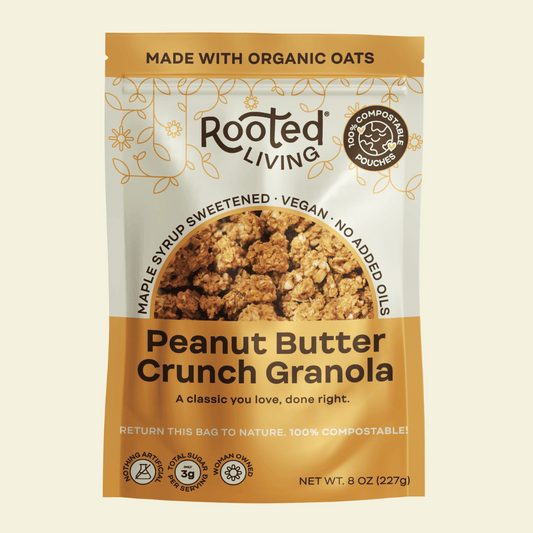 Canned peanut butter crunch granola from Rooted Living in a sealed metal can with a label showing granola close-up.