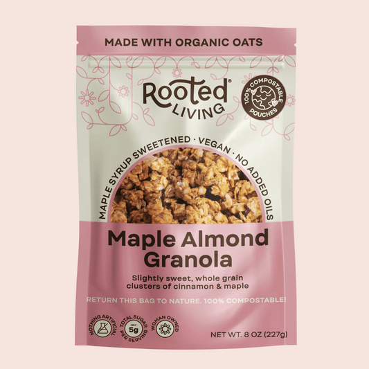 Crunchy maple almond granola from Rooted Living with visible oats, almonds, and a sweet maple glaze.