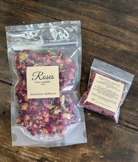 A close-up of vibrant pink rose petals from herbalroseapothecary, arranged in a delicate, natural display.