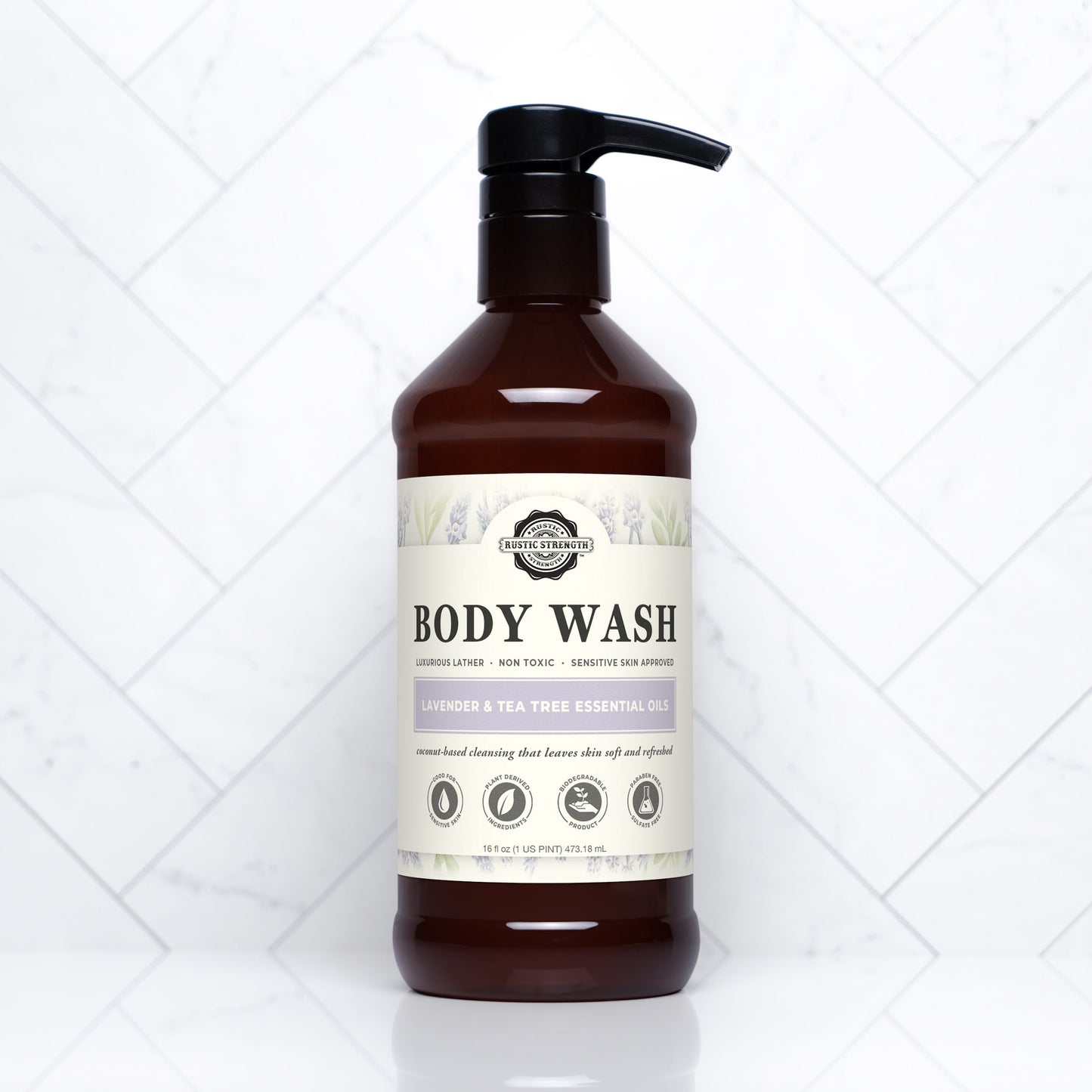 Rustic Strength moisturizing body wash with lavender and tea tree, showing a 16 oz bottle with calming lavender and tea tree ingredients.