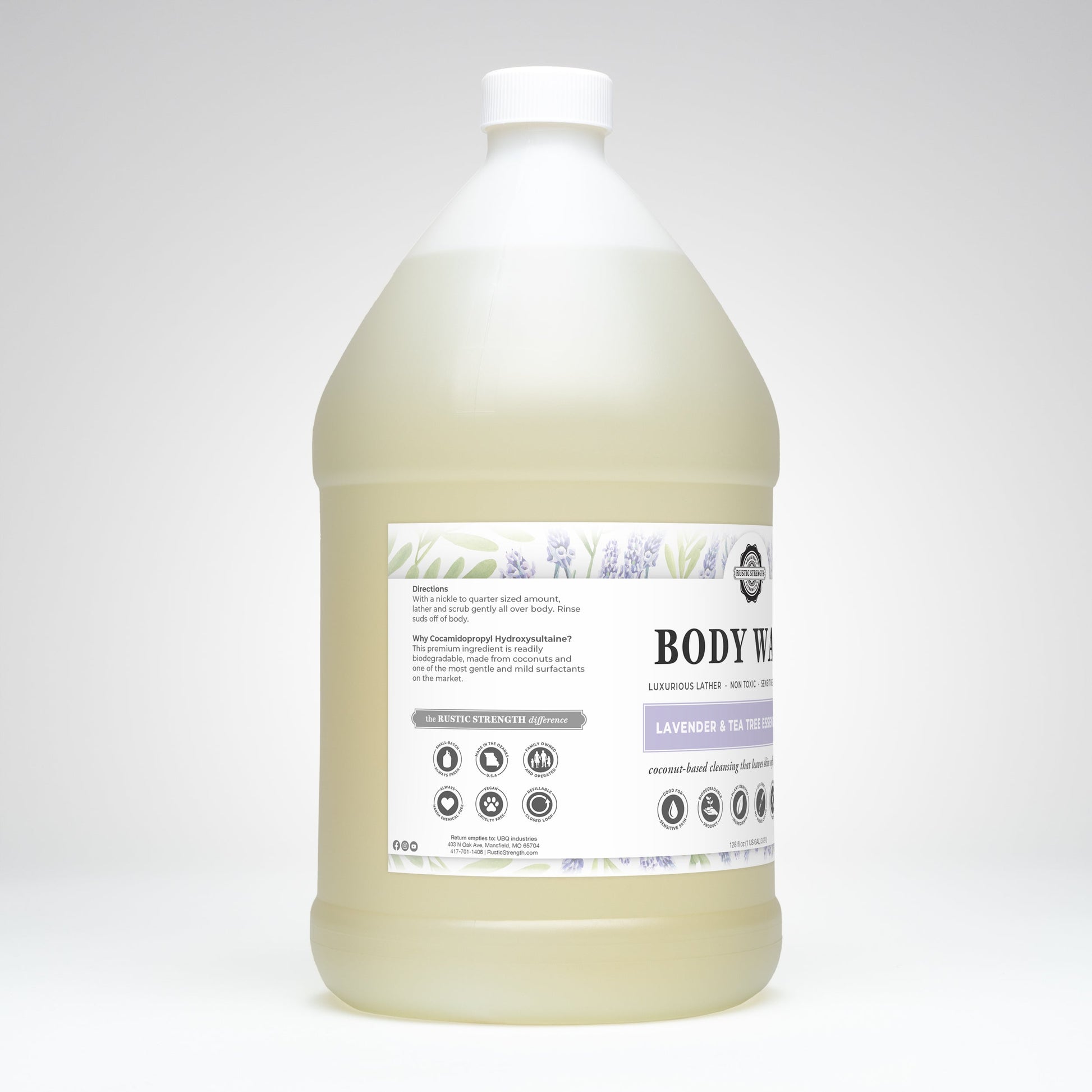 Rustic Strength lavender and tea tree moisturizing body wash in a 16 oz bottle, showing the label and product packaging.