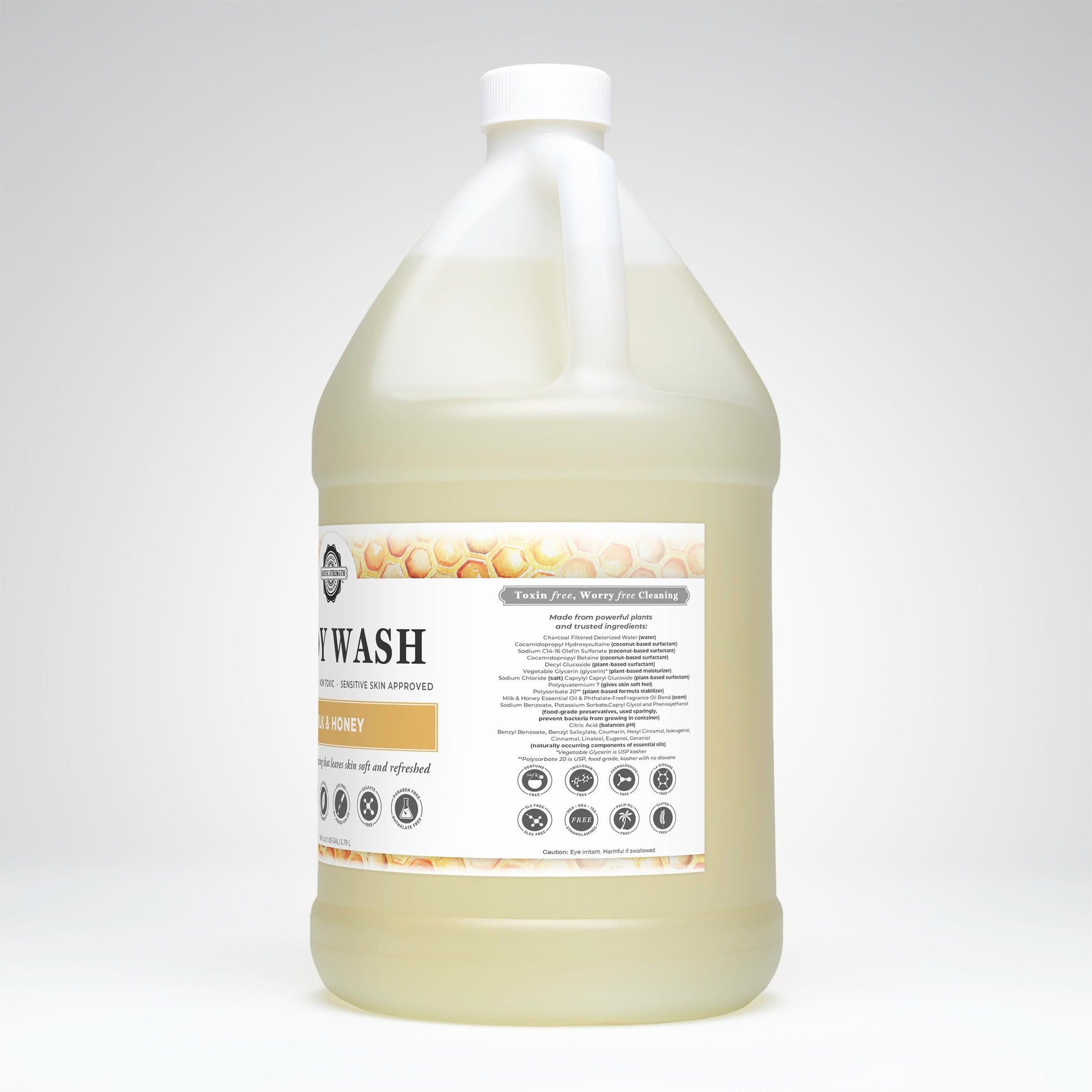 Rustic Strength Milk & Honey Moisturizing Body Wash in a 16 oz bottle, featuring a gentle, nourishing bath and body cleansing formula.