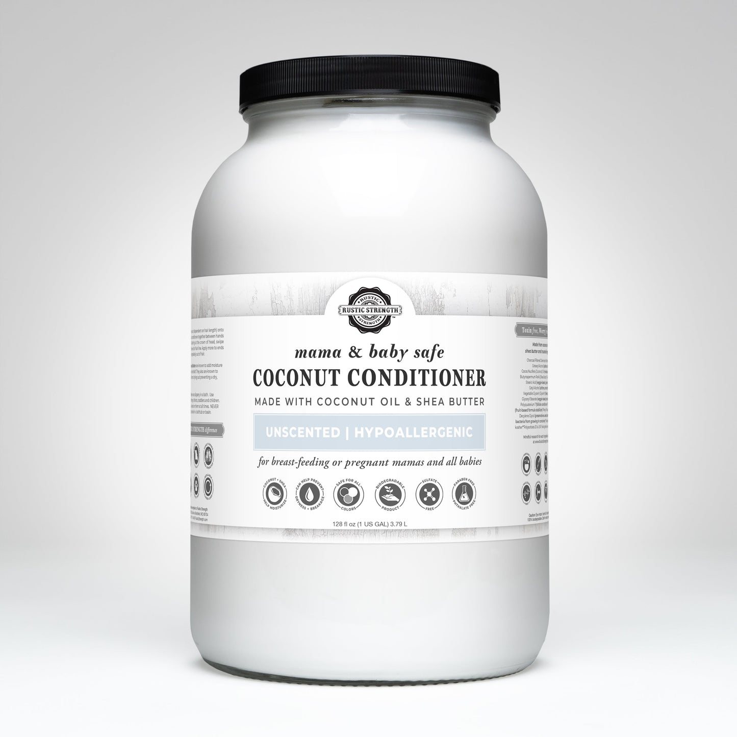 A large white plastic jar labeled Coconut Conditioner | Mama + Baby Safe by Rustic Strength. The label notes it’s unscented, hypoallergenic, and safe for sensitive users, with coconut oil and shea butter.