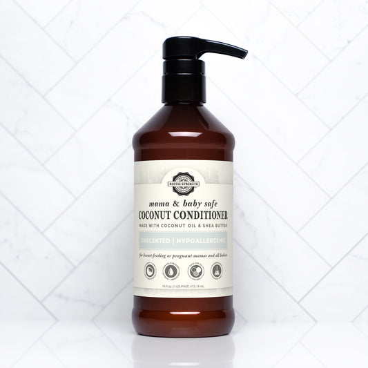 Rustic Strength Coconut Conditioner in a 16 oz bottle, safe for Mama and baby, featuring natural coconut scent and nourishing formula.